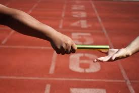 Relay race baton exchange | Premium Photo